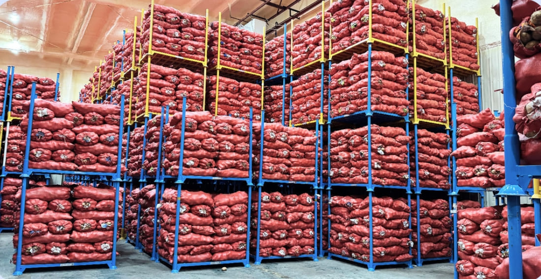 A well-organized warehouse with stackable racks
