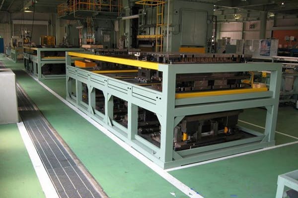 Heavy-duty mold shelf in a workshop