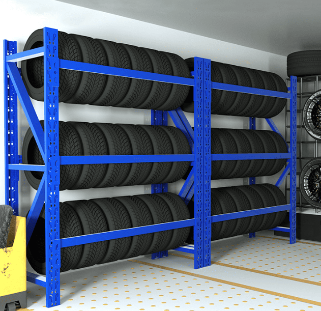 Close-up of a heavy-duty tire rack holding large truck tires.