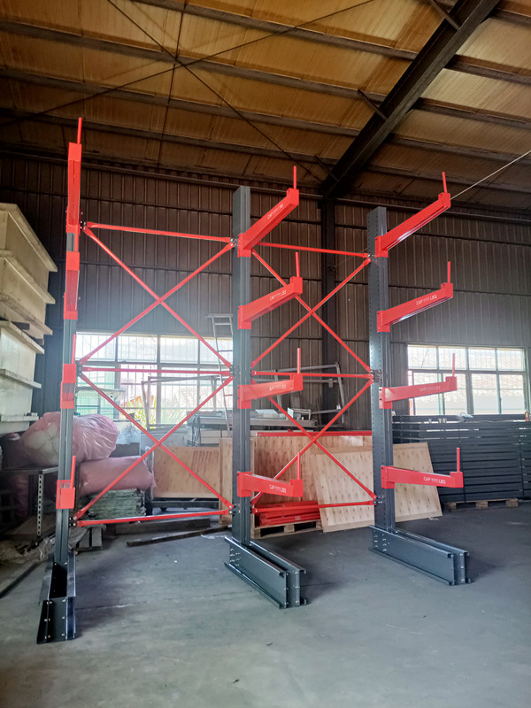A bent and rusted arm on a cheap cantilever rack