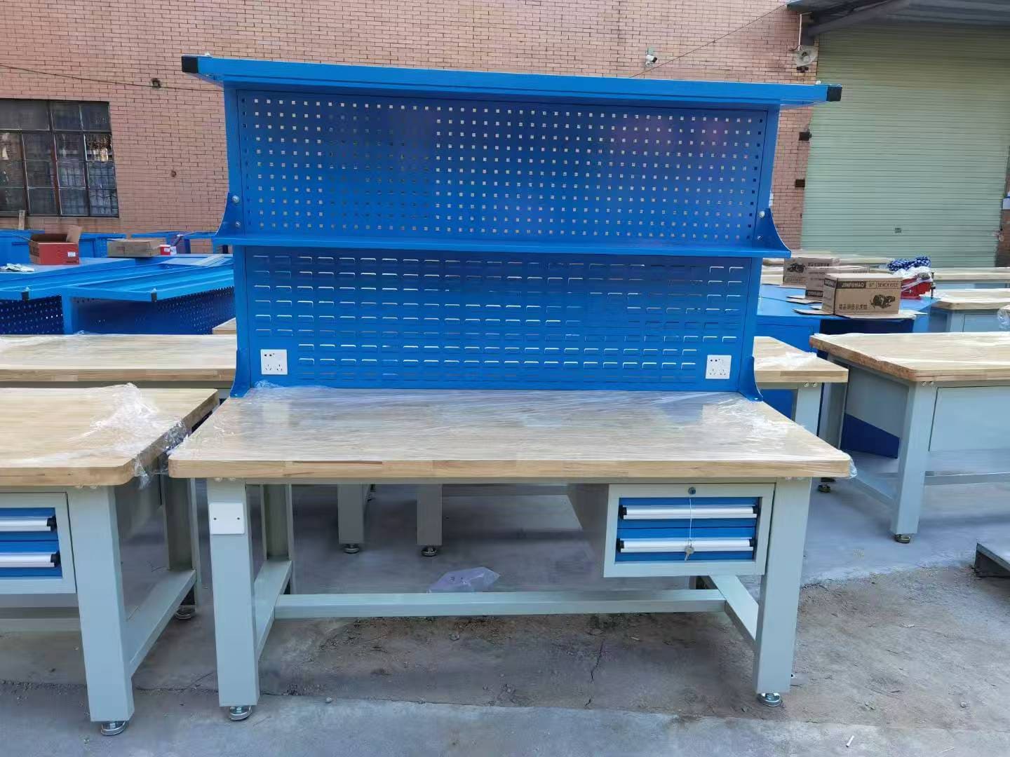 A purchasing manager inspecting an industrial workbench