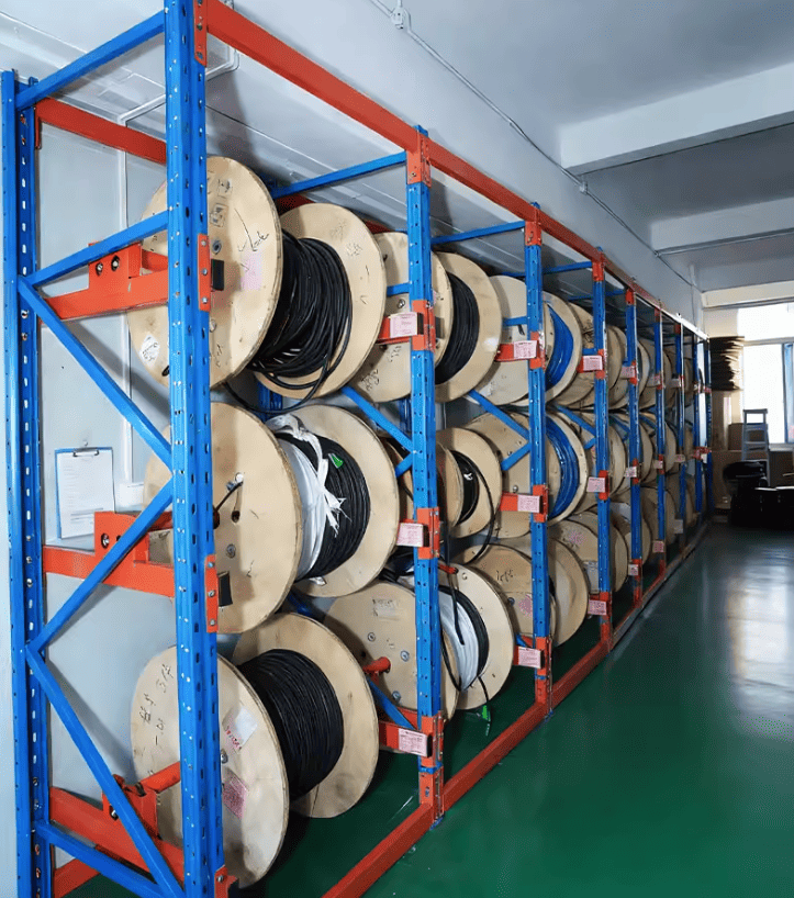 A person with a clipboard inspecting warehouse racking