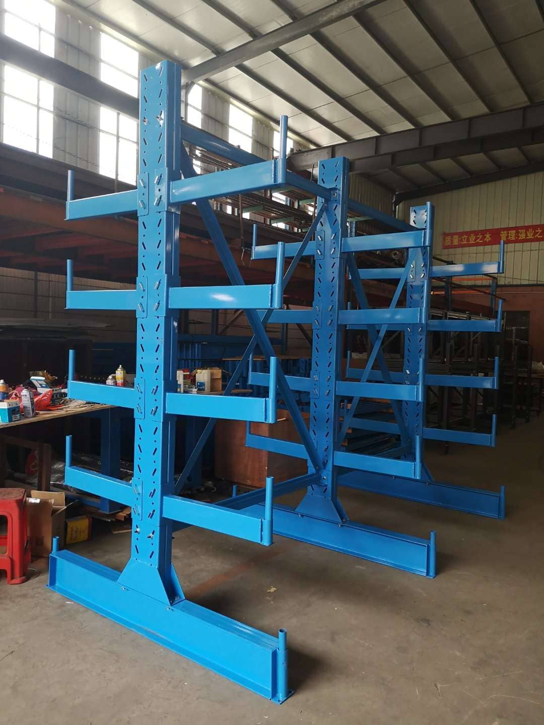 A forklift easily loading lumber onto a cantilever rack