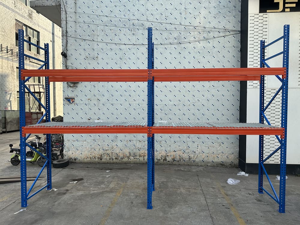 A heavy duty pallet rack in a warehouse holding pallets safely